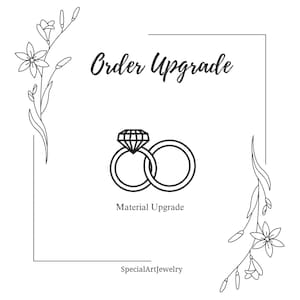May include: Black and white line art illustration of two rings with a diamond on top. The text "Order Upgrade" is at the top of the image. The text "Material Upgrade" is below the rings. The text "SpecialArtJewelry" is at the bottom of the image.