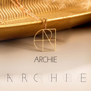 May include: Gold geometric necklace featuring an Archie monogram pendant. The pendant is a minimalist design with intersecting lines forming the letters A, R, C, H, I, and E.  The necklace is displayed on a gold tray. The word ARCHIE is printed below the necklace.  Additional smaller versions of the monogram are shown below the word ARCHIE.
Logo Name Necklace, Minimalist Logo Initials Design, Geometric Letter Jewelry, Couple Gift, Anniversary Gift, Christmas Gift, Gift for Girl