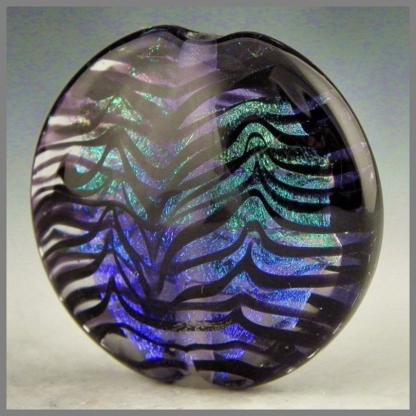 a large lentil focal bead with a dichro core and black stripes handmade lampwork glass - Wild Life