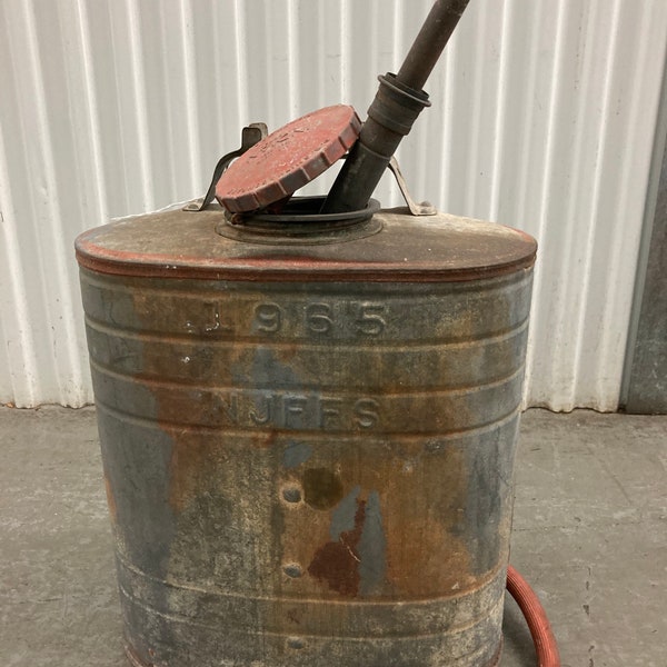 Vintage Distressed Metal Can: Rustic Gardening Decor