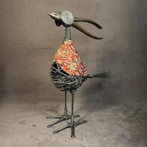 Bird ornament with pliers
