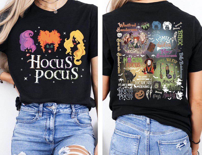 May include: Black t-shirt featuring the text "Hocus Pocus" with illustrations of the Sanderson sisters and stars. The back of the shirt has a collage of images and text related to the movie, including "I smell children" and "Amuck".