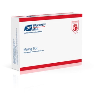 May include: White mailing box with red trim and the text "Priority Mail" and "United States Postal Service". The box also has the text "Mailing Box For Domestic and International Use".
