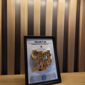 This image focuses on the hand-painted craftsmanship of the Dust2 miniature. Each color and detail is carefully applied to ensure a high-quality, lifelike representation of this beloved map.