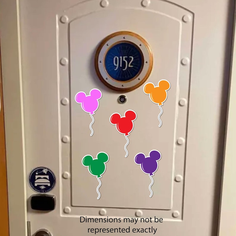 May include: A white door with a porthole window showing the number 9152. Six colourful Mickey Mouse-shaped balloon stickers are attached to the door. The balloons are pink, orange, red, green, and purple. The text "Dimensions may not be represented exactly" is at the bottom.