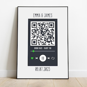 Może przedstawiać: Oprawiony wydruk z projektem cyfrowego odtwarzacza muzyki. Zawiera kod QR, imiona "Emma & James", piosenkę "Marry You" Bruno Marsa oraz datę "09.07.2025."