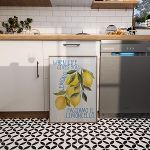 May include: A watercolor print with a white background and a lemon branch with yellow lemons. The text "When life gives you lemons, facciamo il limoncello" is written in blue.
