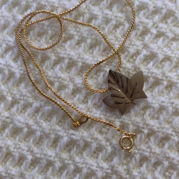 Maple leaf necklace goldstone chain 15 inches.