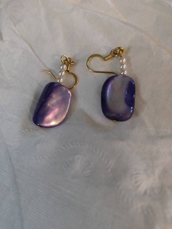 Vintage purple pierced earrings.