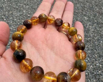 Empowering transformation of solar storm energies with Citrine and Golden Pietersite