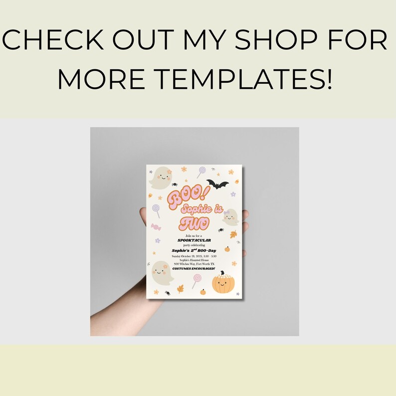 May include: A Halloween-themed invitation card held by a hand. The card features the text "Boo! Sophie is Two" in a playful font, along with illustrations of ghosts, bats, and pumpkins. The card also includes event details.