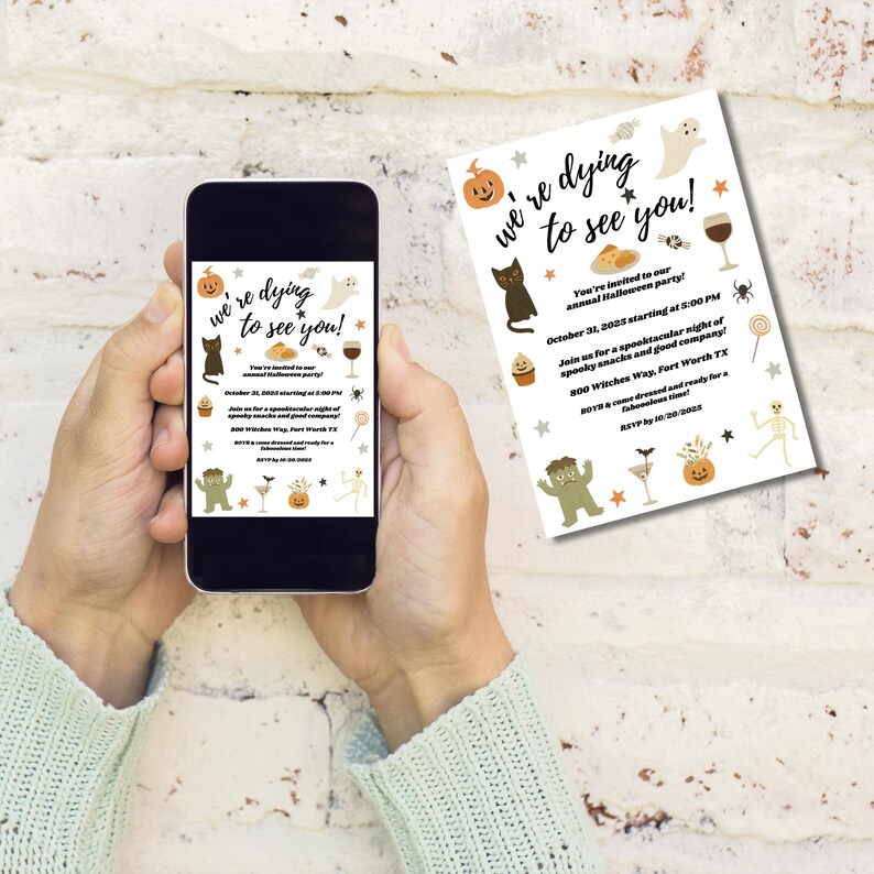 May include: A smartphone displays a Halloween party invitation with the text "we're dying to see you!" The invitation features illustrations of a black cat, pumpkin, ghost, and other spooky elements. A printed invitation with the same design is also visible.