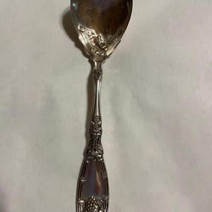 Vintage 1881 Rogers A1, silver sugar spoon 6 inches very nice with grapes