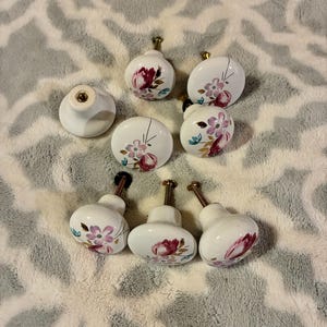 Vintage white porcelian draw pulls set of eight Tulips