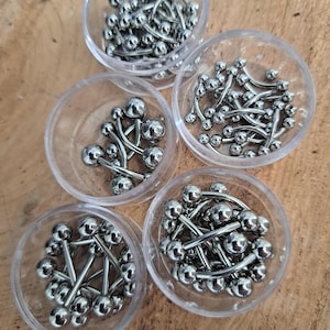 Curved Eyebrow Barbell Surgical Steel Implant grade quality also for helix, tragus, daith, navel, labret, genital, nipple piercings.