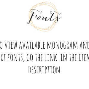 May include: White background with the word "Fonts" in elegant script, encircled by a gold-colored, hand-drawn wreath. Text below reads: "TO VIEW AVAILABLE MONOGRAM AND TEXT FONTS, GO THE LINK IN THE ITEM DESCRIPTION."