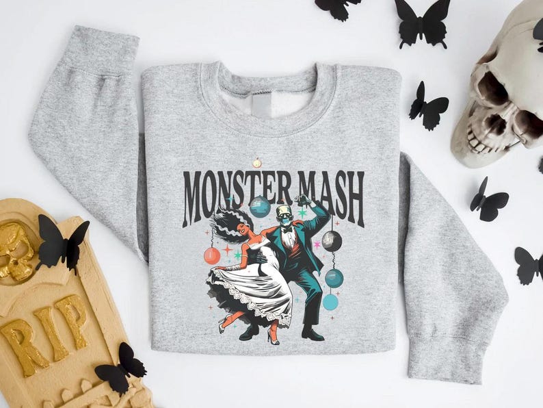 a sweater with a picture of a man and a woman on it