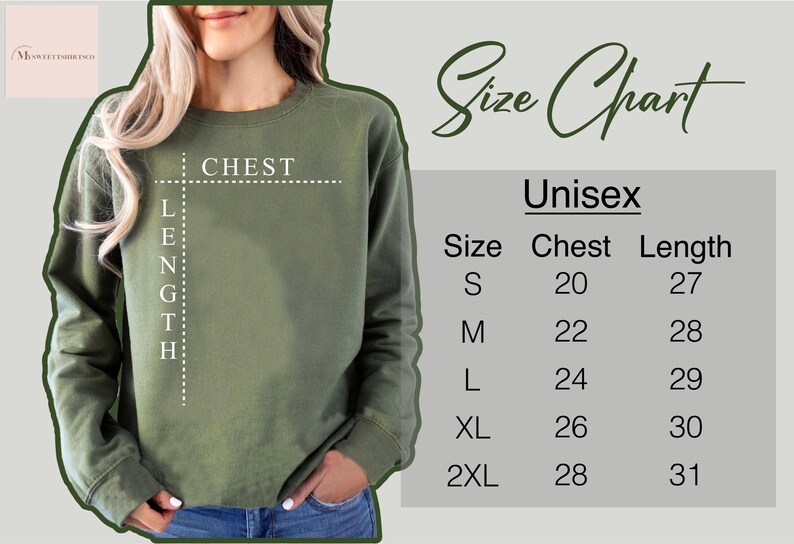 May include: An olive green unisex sweatshirt with a size chart. The size chart shows chest and length measurements in inches for sizes S, M, L, XL, and 2XL. The sweatshirt is shown on a person.