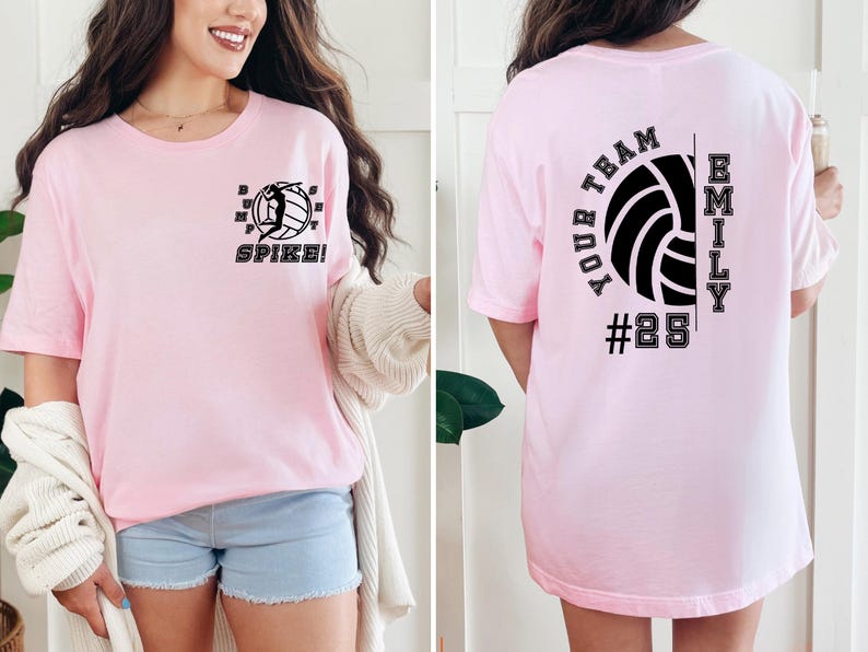 May include: Pink volleyball t-shirt with a graphic of a volleyball player spiking the ball on the front and the text "YOUR TEAM" and a volleyball with the text "EMILY #25" on the back.