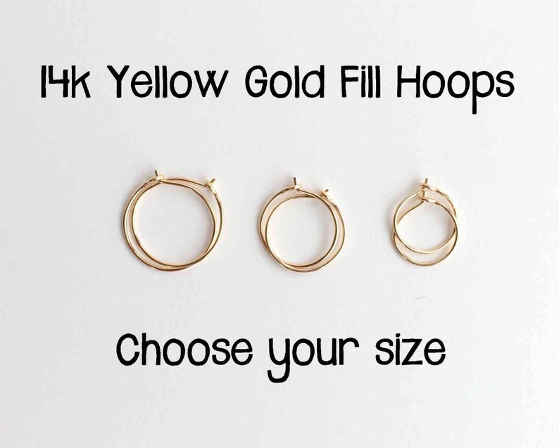 May include: Three pairs of 14k yellow gold fill hoop earrings in different sizes. Choose your size.