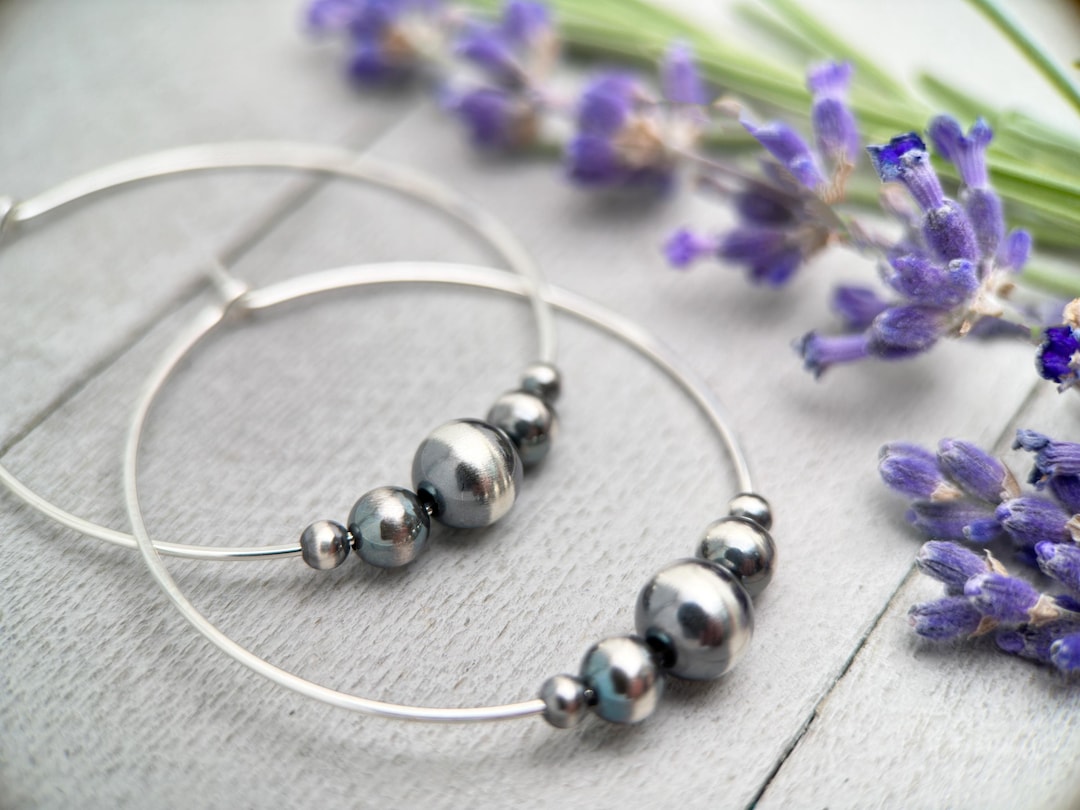 Navajo Handmade Sterling Silver Feather Hoop Earrings main image 0