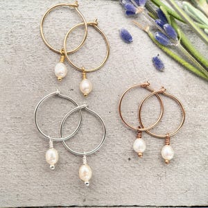 White Freshwater Pearl Charm Hoop Earrings. Available in Solid 925 Sterling Silver, 14k Yellow or Rose Gold Fill
