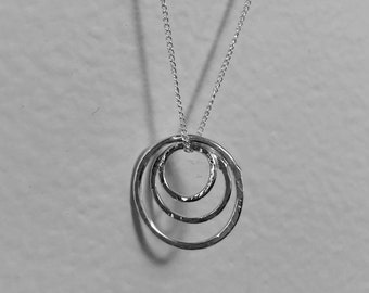 Triple Trio Circles Necklace by Kitty Stoykovich Designs. Three rings necklace. Handmade 925 Sterling silver circle pendant.