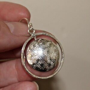 Floating Stamped Dome earrings. Sunburst or stars stamping. Lots of movement and shine. sterling silver and all handmade. dangle earrings
