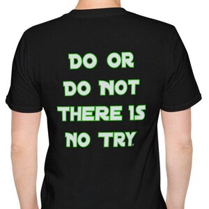 May include: Black t-shirt with green text that reads "Do or do not, there is no try."