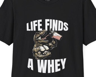 Camiseta Life Finds A Whey com estampa de dinossauro para levantamento de peso, roupa de treino geek.
