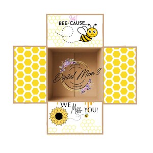 May include: A yellow and black bee with a honeycomb pattern background. The text "Just Bee-Cause..." is at the top of the box. The text "We Miss You!" is at the bottom of the box. A sunflower is in the corner of the box.