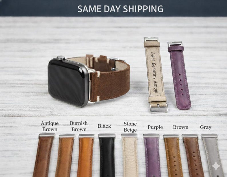 May include: An Apple Watch with a brown leather band is displayed, along with several replacement bands in various colors: antique brown, burnish brown, black, stone beige, purple, brown, and gray. The text "SAME DAY SHIPPING" is visible.