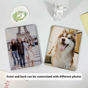 May include: Two personalized phone cases with custom photos. One case features a family photo in front of the Eiffel Tower, and the other showcases a close-up of a dog with the name "Brannon". The text "Front and back can be customized with different photos" is also visible.