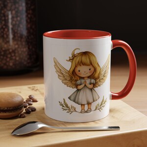 Taza de café con alas de ángel. Diseño de ángel caprichoso. Ideal para el hogar, regalos, coleccionables, festividades y momentos espirituales. imagen 1