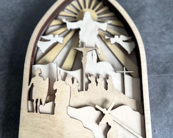 Wooden Easter decoration. Multi-layered wall or table decoration depicting Golgotha and the Resurrection as a gift for Christians.