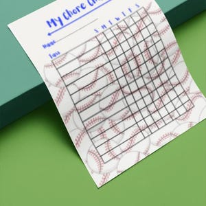 May include: A white baseball-themed chore chart with a grid for tracking tasks. The chart features a baseball pattern and the words "My Chore Chart" in blue. A baseball player graphic is at the top.