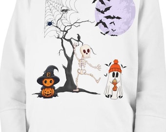May include: White long-sleeved top with a Halloween design. The graphic includes a tree, skeleton, pumpkin, ghost, bats, and a full moon. The pumpkin wears a witch's hat, and the ghost wears a beanie.