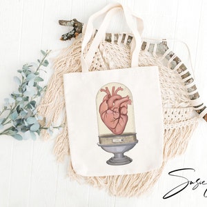 Easily Excitable Anatomical Heart in Glass Display Canvas Tote Bag image 2