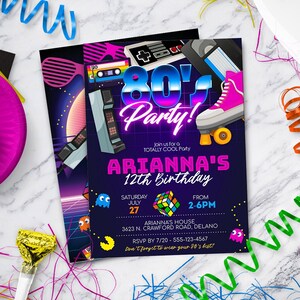 May include: A neon pink and blue 80's themed birthday party invitation with a cassette tape, roller skates, and a video game controller. The invitation says "Join us for a Totally Cool Party" and "Arianna's 12th Birthday". The party is on Saturday, July 27th from 2-6pm at Arianna's house. RSVP by 7/20 at 555-123-4567.