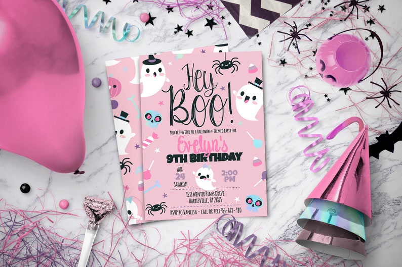 May include: A rectangular pink Halloween-themed invitation card featuring white ghosts wearing black top hats, black spiders, blue skulls, and sweets. The text reads Hey Boo! You're invited to a Halloween-themed party for Evelyn's 9th birthday.