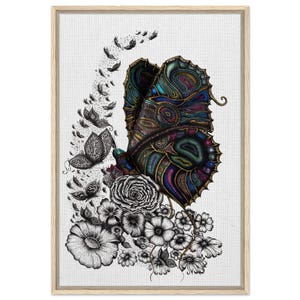 May include: Framed art print showing a detailed illustration of a butterfly with intricate patterns in blue, green, and gold. The butterfly is surrounded by black and white flowers and other butterflies, set against a white background.