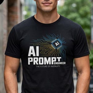 May include: A black short-sleeved t-shirt featuring a graphic of a blue and gold circuit board pattern with a central chip icon labeled AI. The text reads AI PROMPT ENGINEER THE FUTURE OF INGENUITY. A black circle in the corner contains the word BLACK.