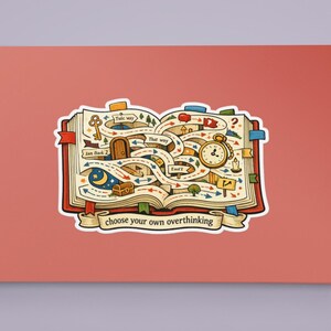 May include: A sticker depicting an open book with a maze design, a key, a clock, and the text "choose your own overthinking." The book has a red cover and is set against a coral background.