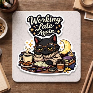 May include: A sticker featuring a black cat wearing glasses and a sweater, resting its chin on its hand. The sticker has the text "Working Late Again" and includes coffee, books, and a moon.