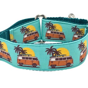 May include: A teal dog collar featuring a repeating pattern of orange vintage vans, palm trees, and yellow suns. The collar has a teal backing and silver metal hardware.