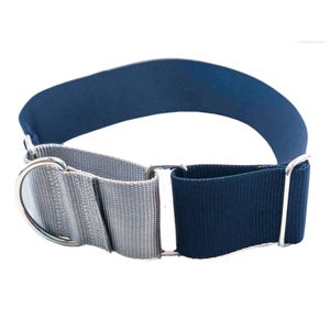 May include: A navy blue and silver grey nylon collar featuring a metal D-ring and adjustable silver-toned metal hardware. The collar is constructed from durable woven webbing with a two-tone colour scheme and includes a sliding buckle for sizing.