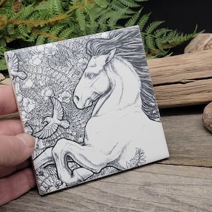 May include: Black and white illustration of a horse running through a forest. The horse is drawn in a detailed style with a flowing mane and tail. The forest is filled with trees and leaves.