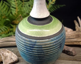 Raku fired bottle with altered, copper matte texture Pottery with Green & white crackle  Glaze -Corvus Moon Studio original