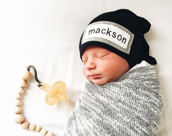 Newborn knot beanie in black jersey knit