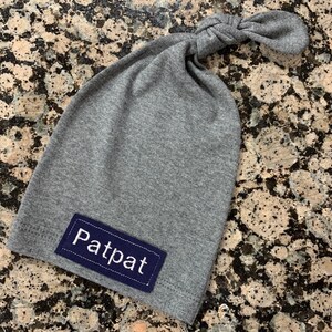 Newborn knot beanie in dark gray jersey knit